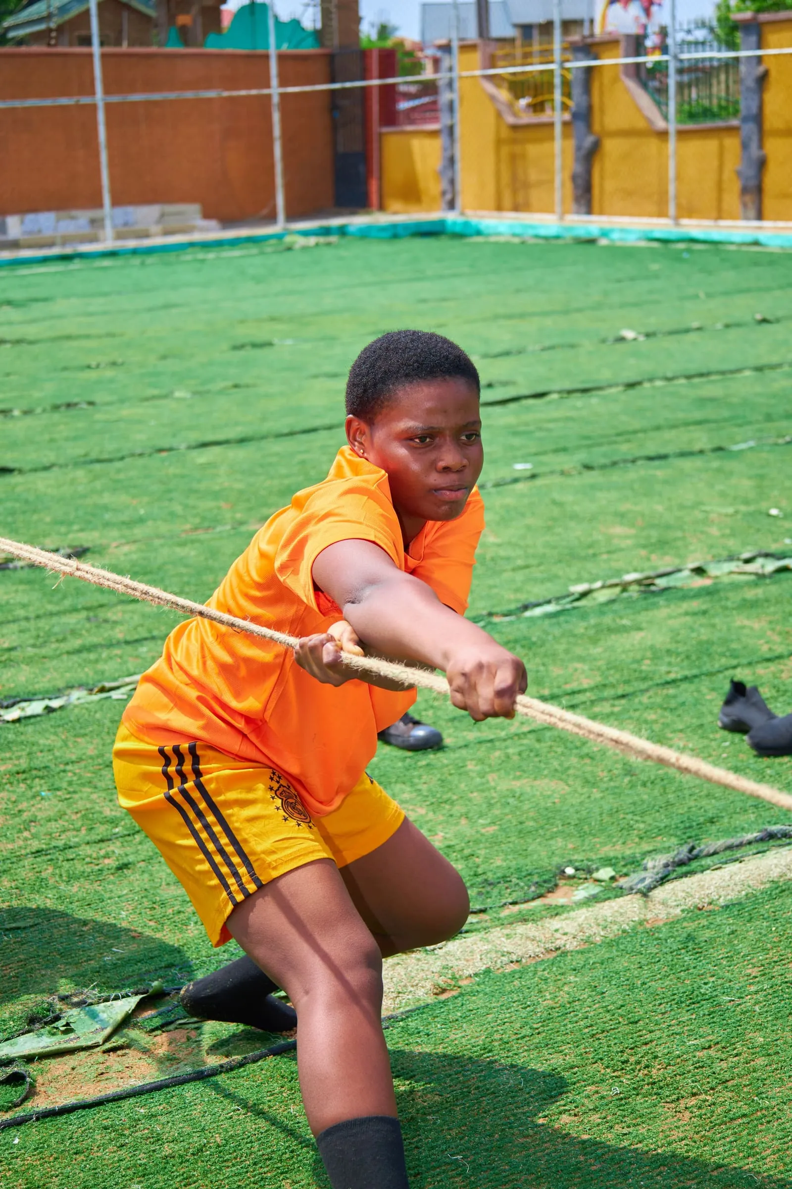 Pupils in football kit on the field during Sports Day