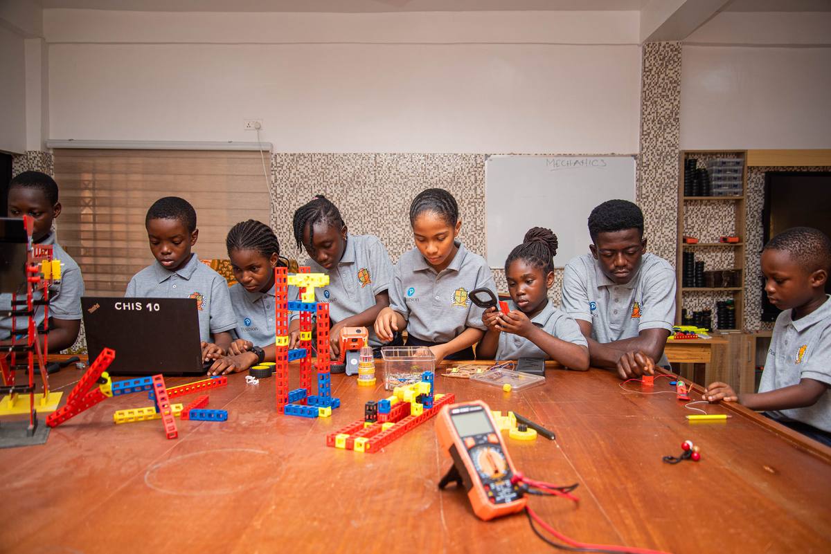 Students building models in the Crystal Heights robotics studio
